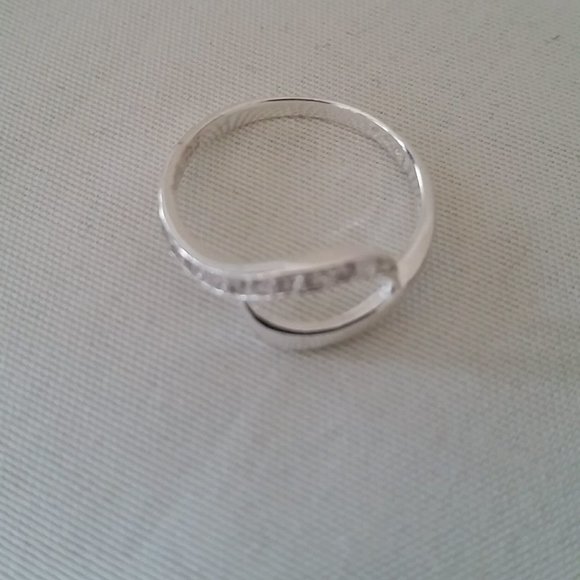 CUBIC ZIRCONIA PAVE' INFINITY RING. SIZE 6 - Picture 2 of 3